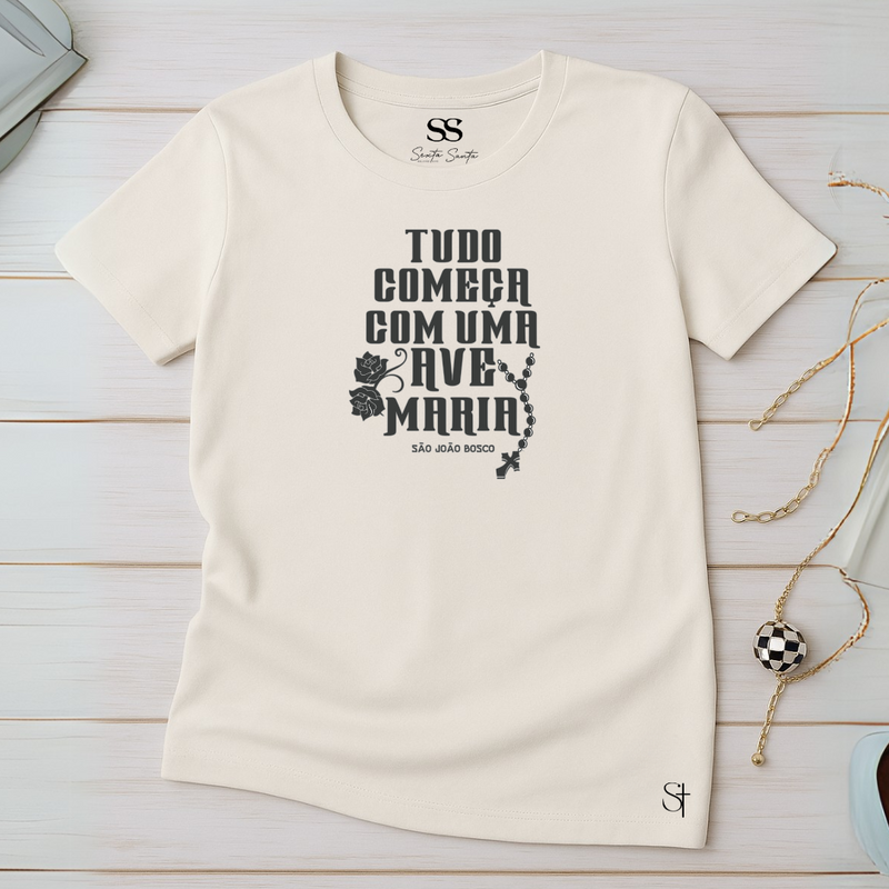 Camiseta Feminina Off-White Tudo Começa Com Um Ave Maria